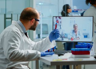 male-chemist-listening-professional-doctor-on-vide-2022-03-07-16-22-26-utc